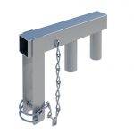 The image shows a gate hinge mechanism. It consists of a long, horizontal metal bar with two vertical cylindrical protrusions at each end, designed to be attached to a gate post. A third cylindrical protrusion is located in the center beneath the bar, connected to a chain that loops through a metal ring. The entire assembly is made of stainless steel with a polished finish, giving it an industrial yet sleek appearance. This hinge allows gates to swing open or closed smoothly.